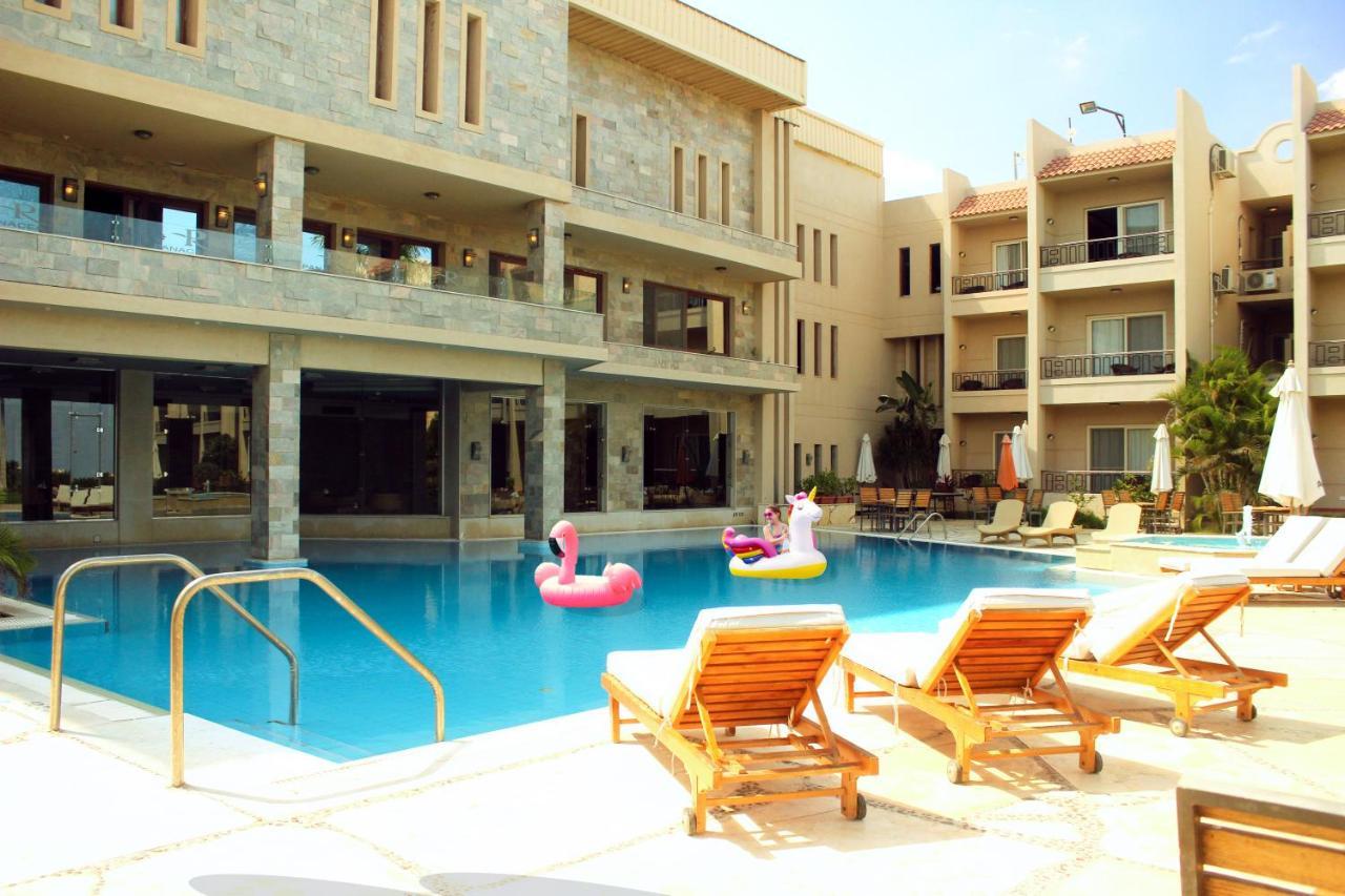 Panacea Suites Hotel Борг-эль-Араб Экстерьер фото