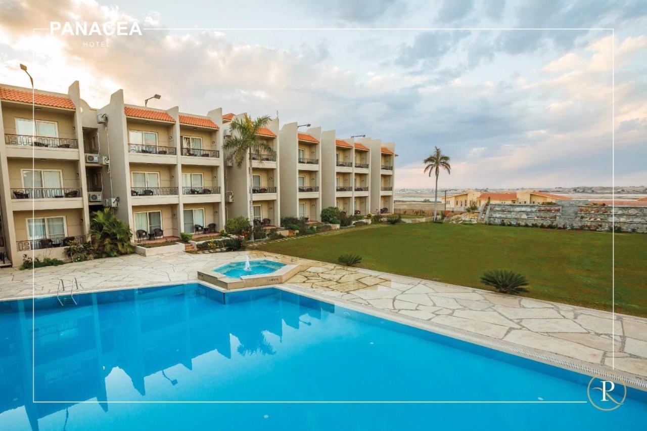 Panacea Suites Hotel Борг-эль-Араб Экстерьер фото