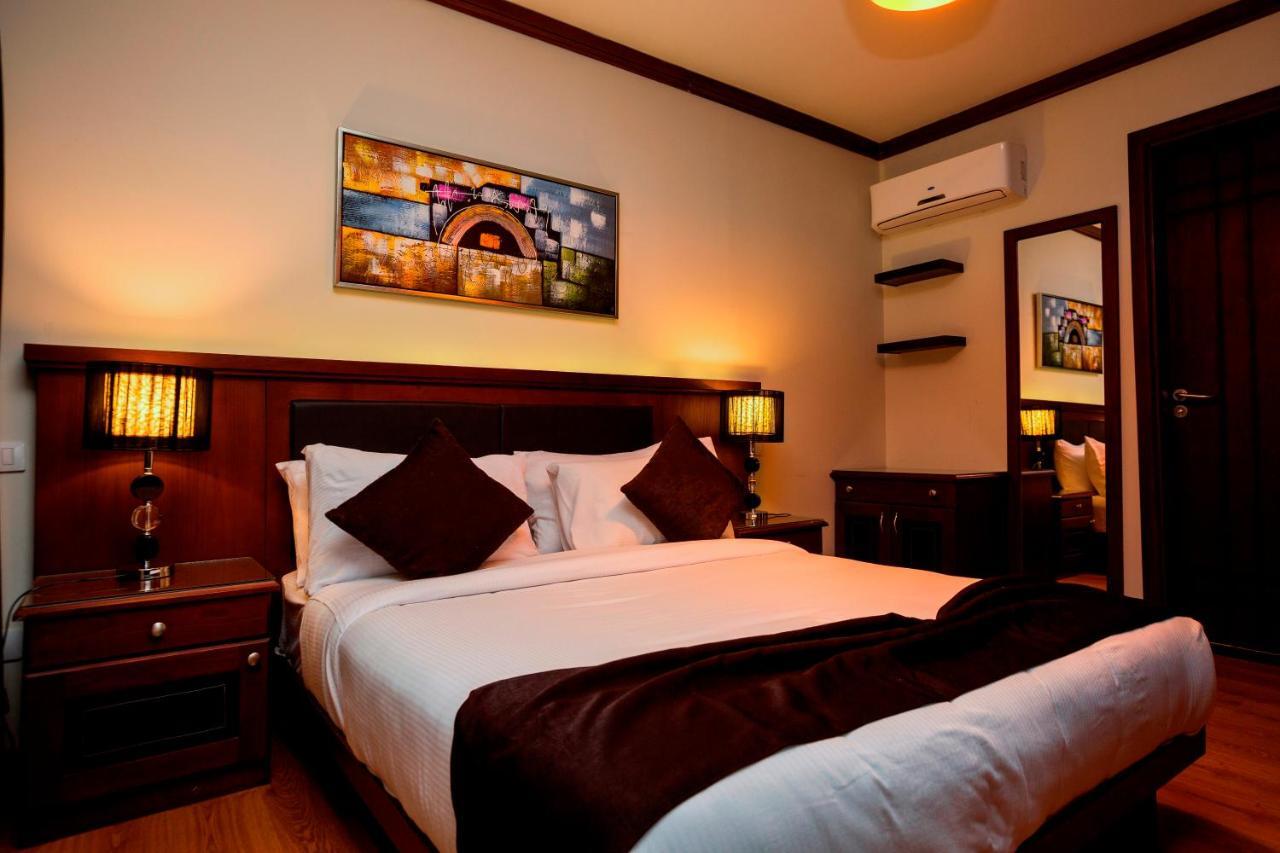 Panacea Suites Hotel Борг-эль-Араб Экстерьер фото